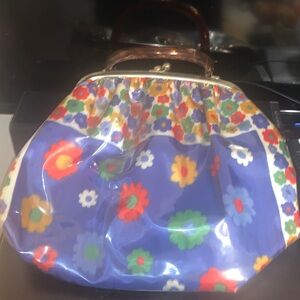 JR Floral Patterned Handbag with Brown lucite Handle.